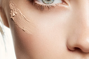 Woman applying makeup foundation on her clean face, preparing fo, a Beauty & Fashion Photo by Studio ANNA (Thumbnail 1 of 2)