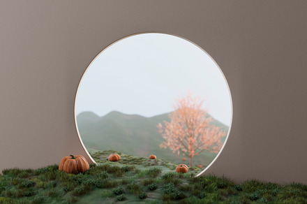 Pumpkin field behind white concrete wall with round window and e