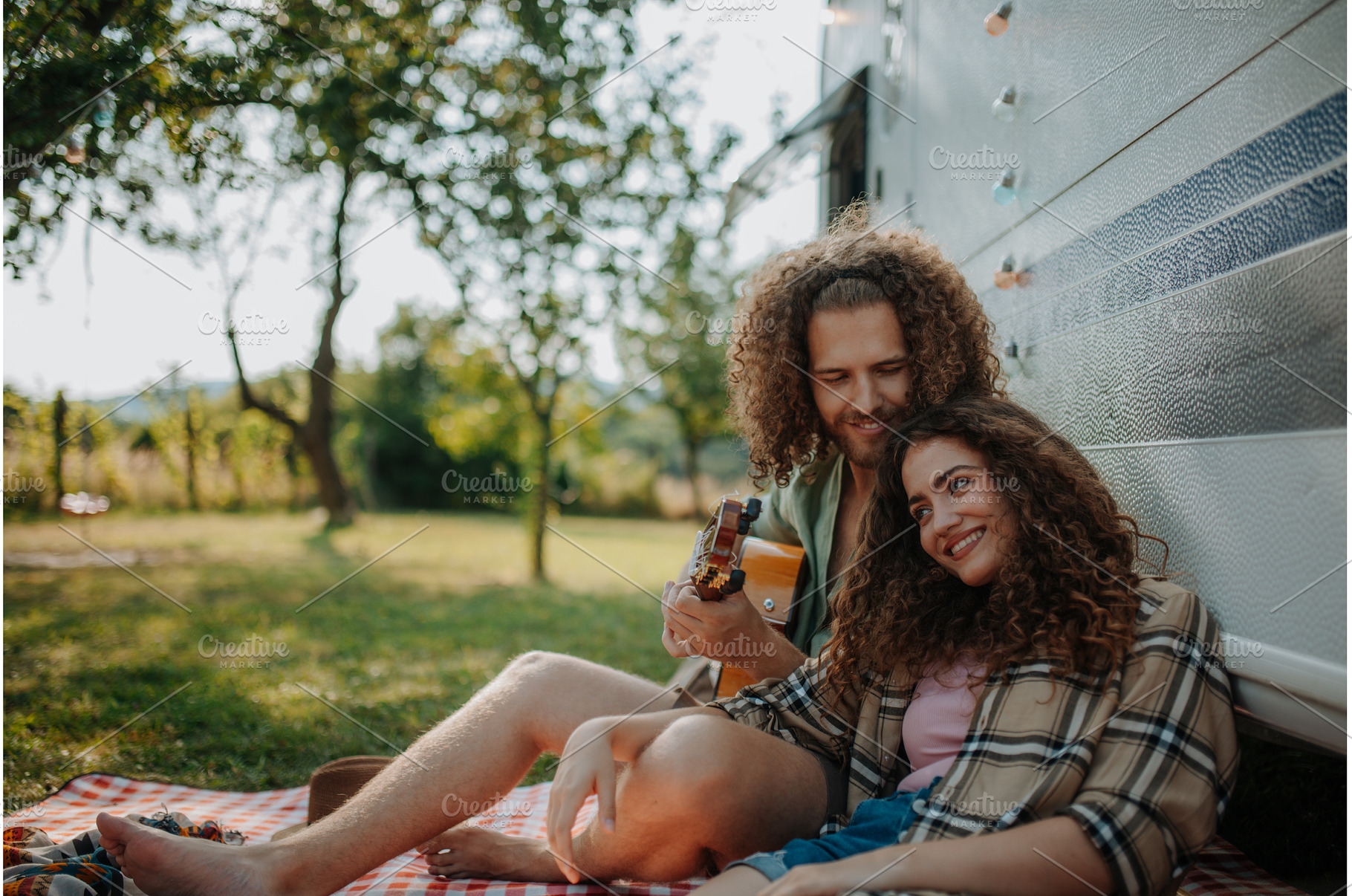 Couple sitting by caravan, enjoying, a Person Photo by HalfPoint