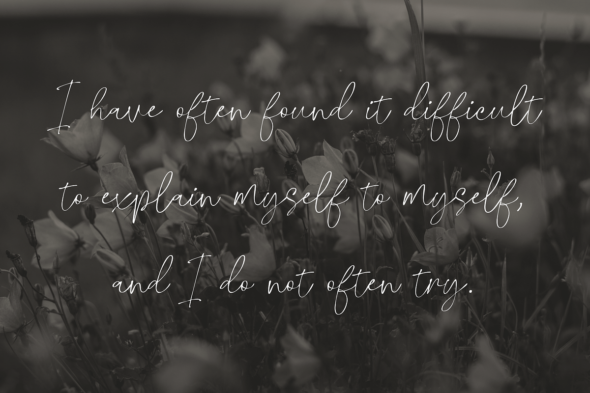 Glossily Enigmatic - a Modern Font, a Script Font by Ali Hamidi (Photo 2 of 9)