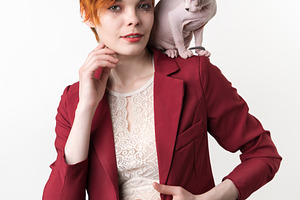 Portrait of woman and playful cat, a Person Photo by Alexander-Piragis