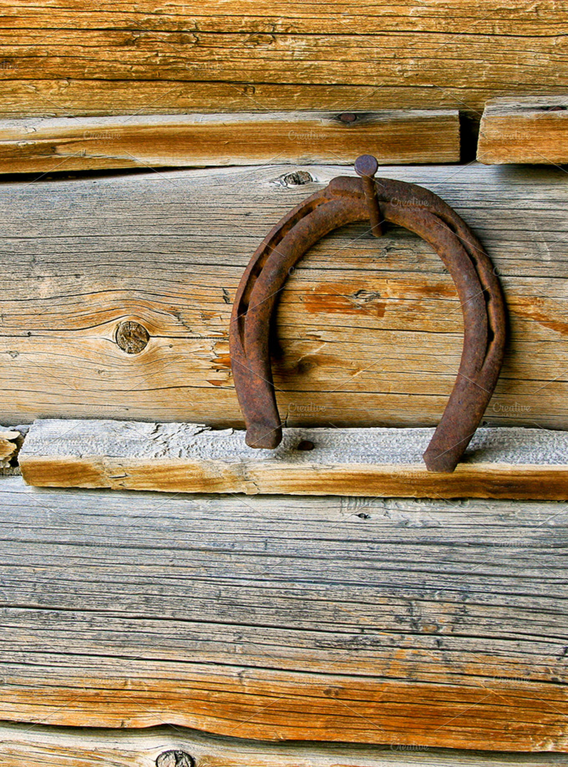 Vertical lucky horseshoe containing aged, element, and equestrian, an Architecture Photo by RodeoPixels WesternImage