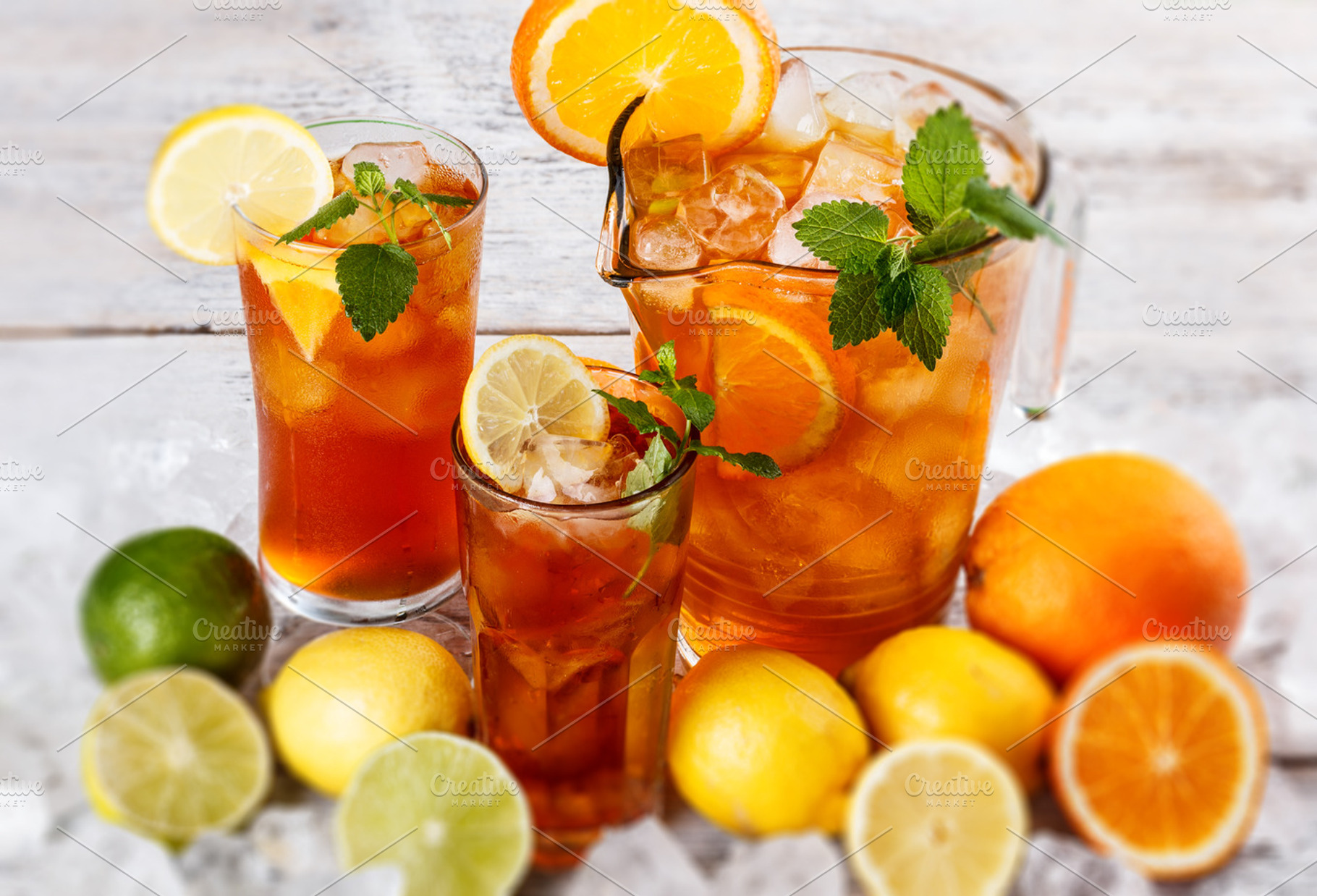 Glass of ice tea featuring background, beverage, and citrus