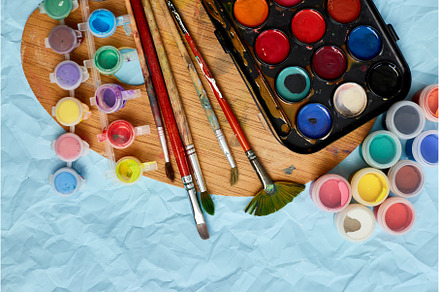 Flat lay of colorful paints, an Arts & Entertainment Photo by IlliaBondarPhotography