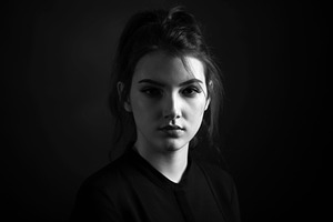 Dramatic black and white portrait of featuring girl, face, and lady