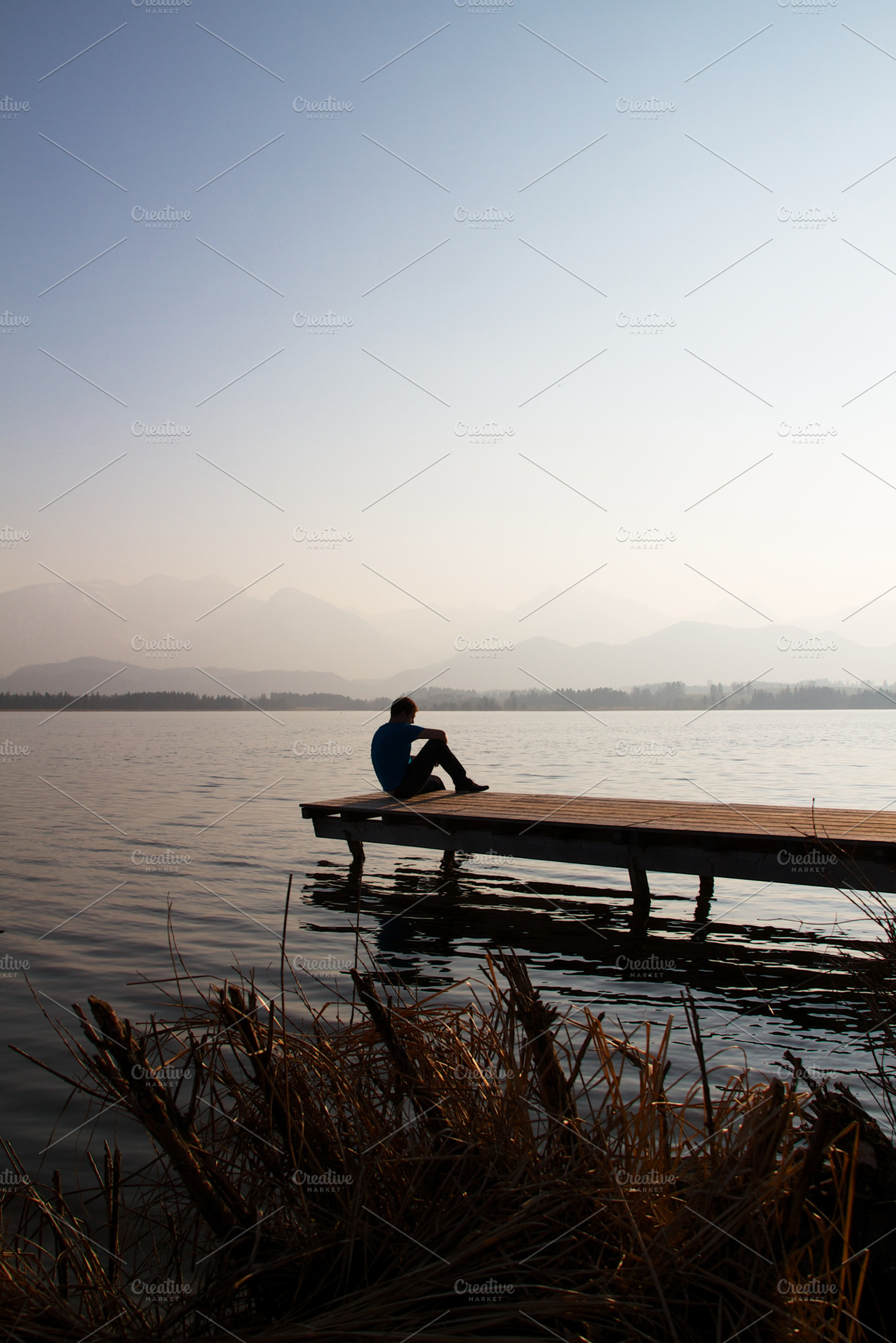 Thinking man stock photo containing blue and sky