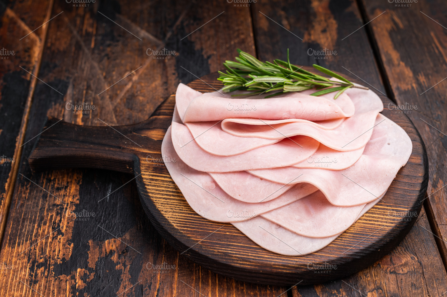 Close up of savory sliced ham showcasing its rich color and text, a Food & Drink Photo by composter-box@mail.ru