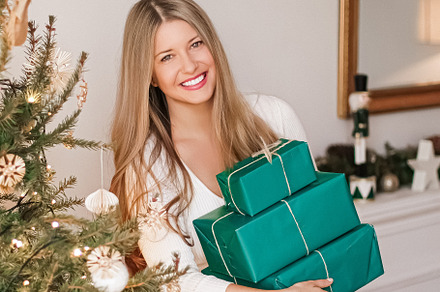 Christmas holiday and gifts for her concept. Happy smiling woman, a Person Photo by Anneleven