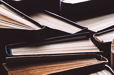 Old and used books knowledge containing background, retro, and pattern