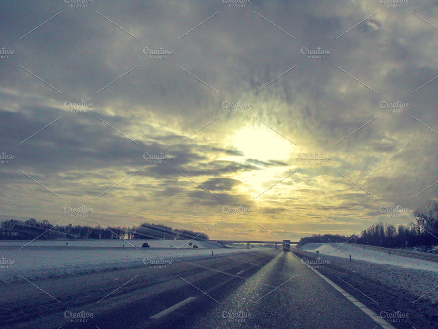 On The Road Containing Winter Snow And Sunset