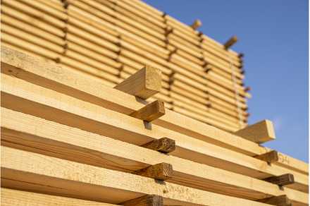 Storage of piles of wooden boards on, an Industrial Photo by volodymyrshtun13795