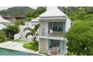 Woman relaxing on modern villa