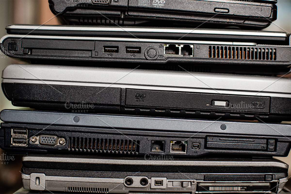 old laptop computers bundle, a Technology Photo by VetalStock (Photo 3 of 7)