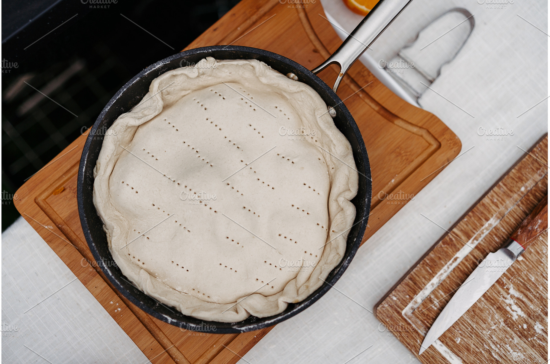 Unbaked rustic fruit galette is, a Food & Drink Photo by HalfPoint
