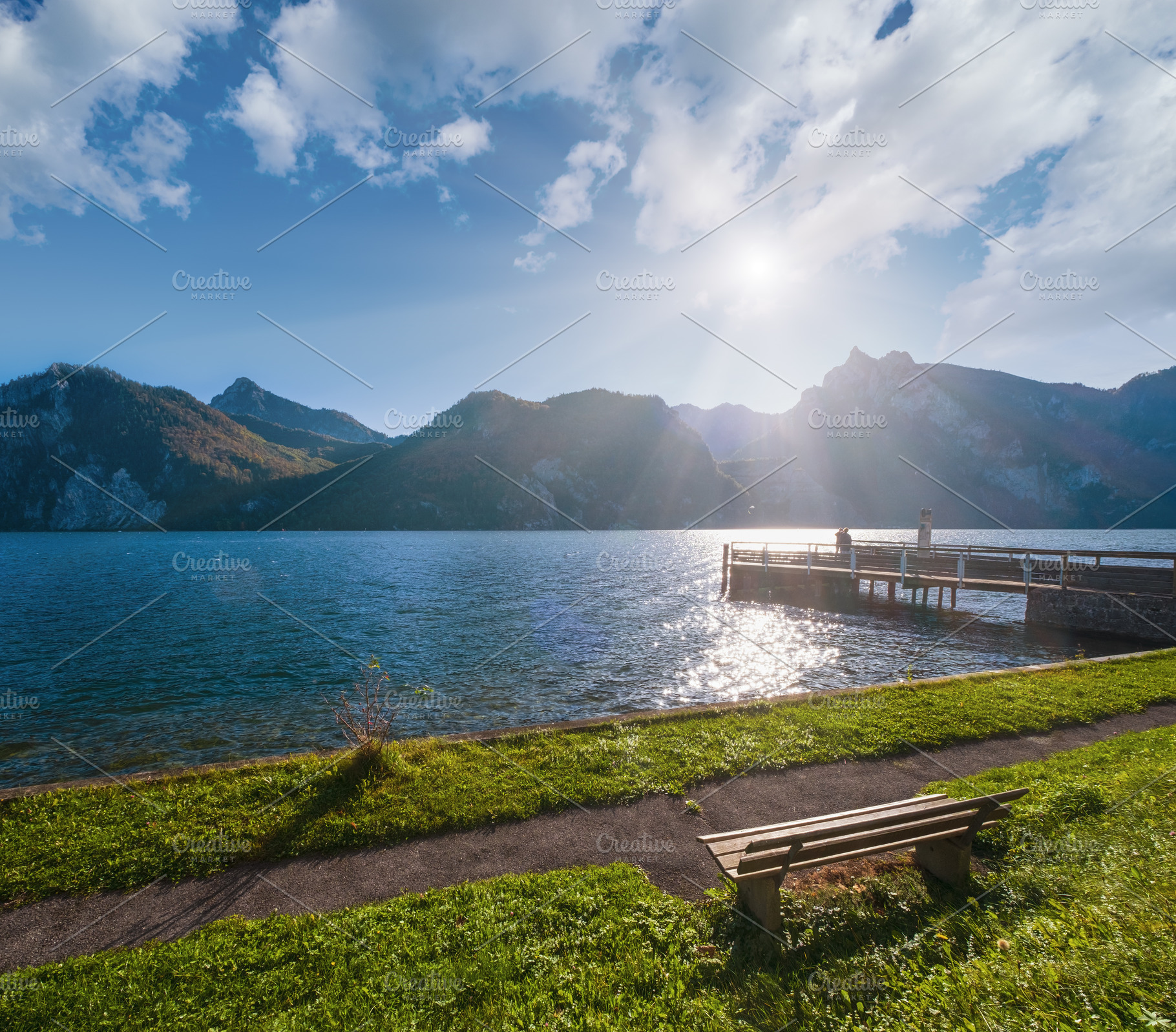 Peaceful autumn Alps mountain lake. Morning view to Traunsee lak, a Nature Photo by YuriyB