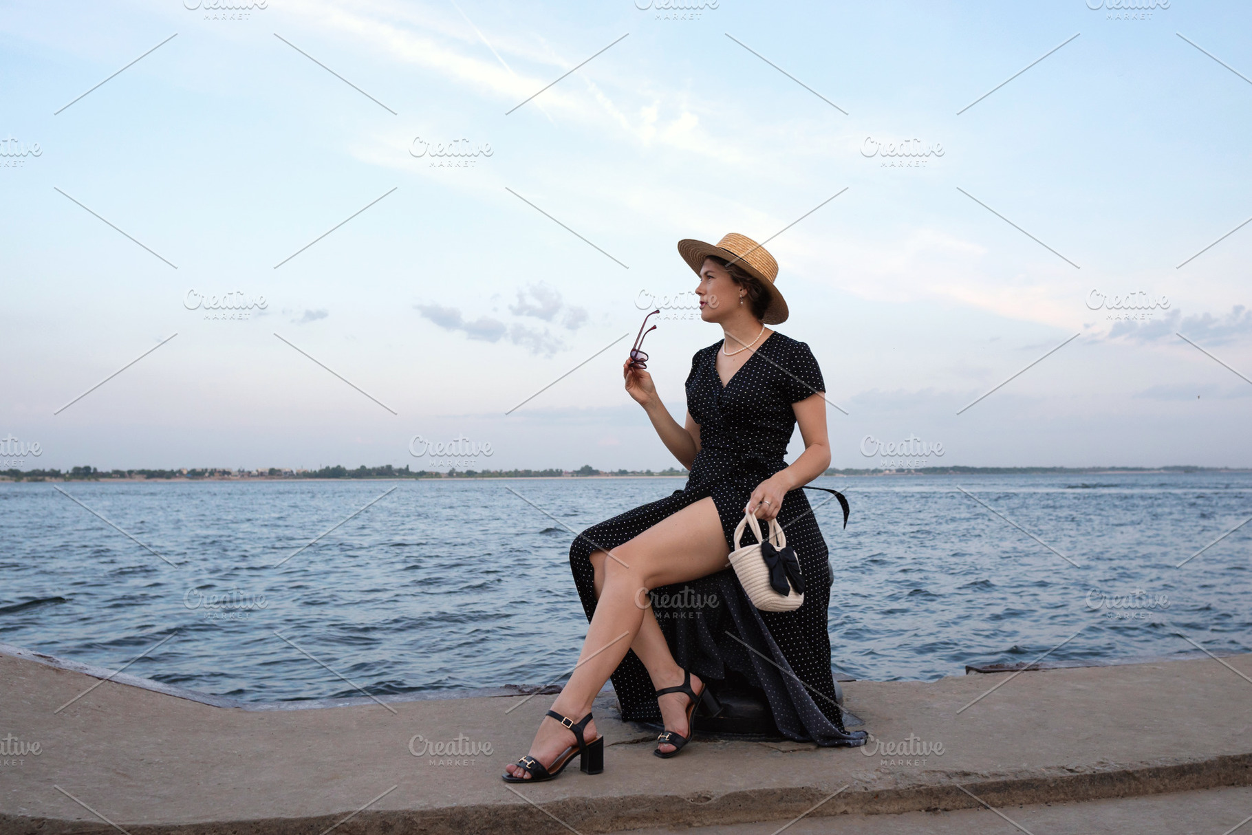 Woman in polka-dot dress gazes, a Person Photo by Elena Vagengeim