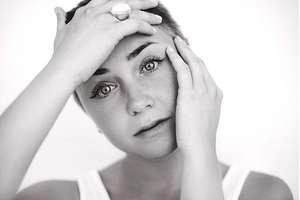 Young woman covering her head, a Beauty & Fashion Photo by Anna Efetova