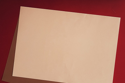 Beige and brown A4 papers as office stationery flatlay, luxury b, a Business Photo by Anneleven