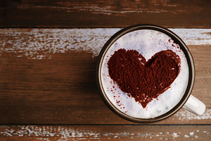 Coffee Lover Concept. Hot Coffee Cup with a Heart Shape Latte Ar, a Photo by salmon.black