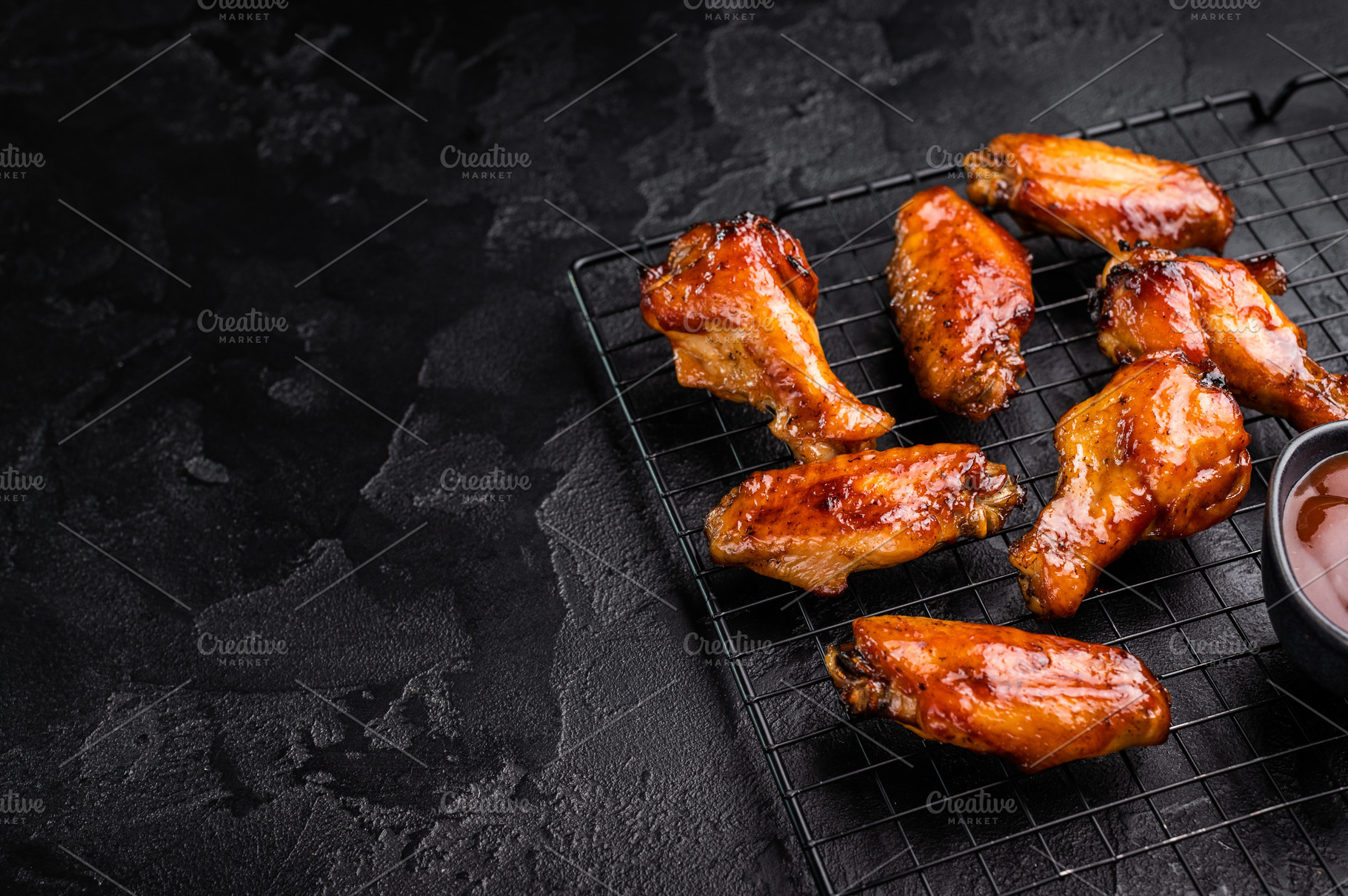 Mouthwatering BBQ chicken wings, coated in a rich sauce, perfect, a Food & Drink Photo by composter-box@mail.ru
