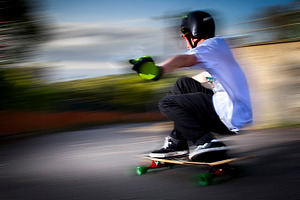 Skateboarder containing action, adult, and air