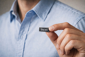 a man holding an incel pin, generative AI, a Photo by Nito