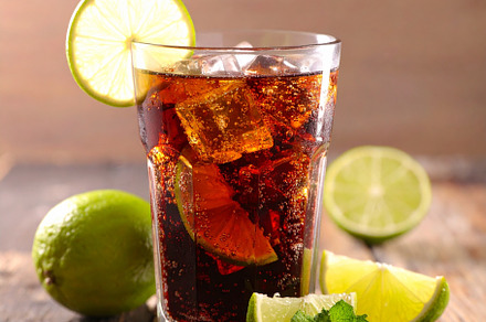 cola drink with ice and lime AI generated