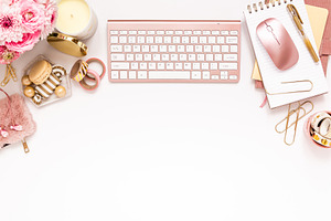 Gold & pink stationery on desktop stock photo containing banner images and
