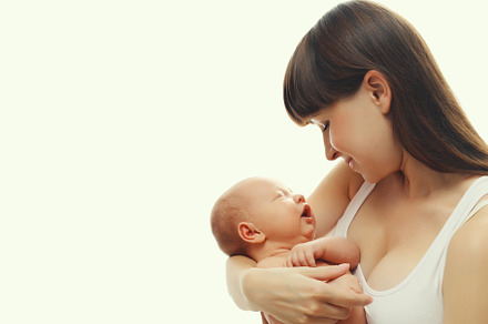 Happy mother holding cute infant, ba, a Person Photo by Rohappy