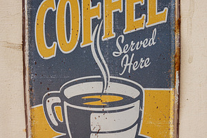 Vintage sign promoting hot fresh coffee with retro design and warm ambiance, a Photo by AS photostudio