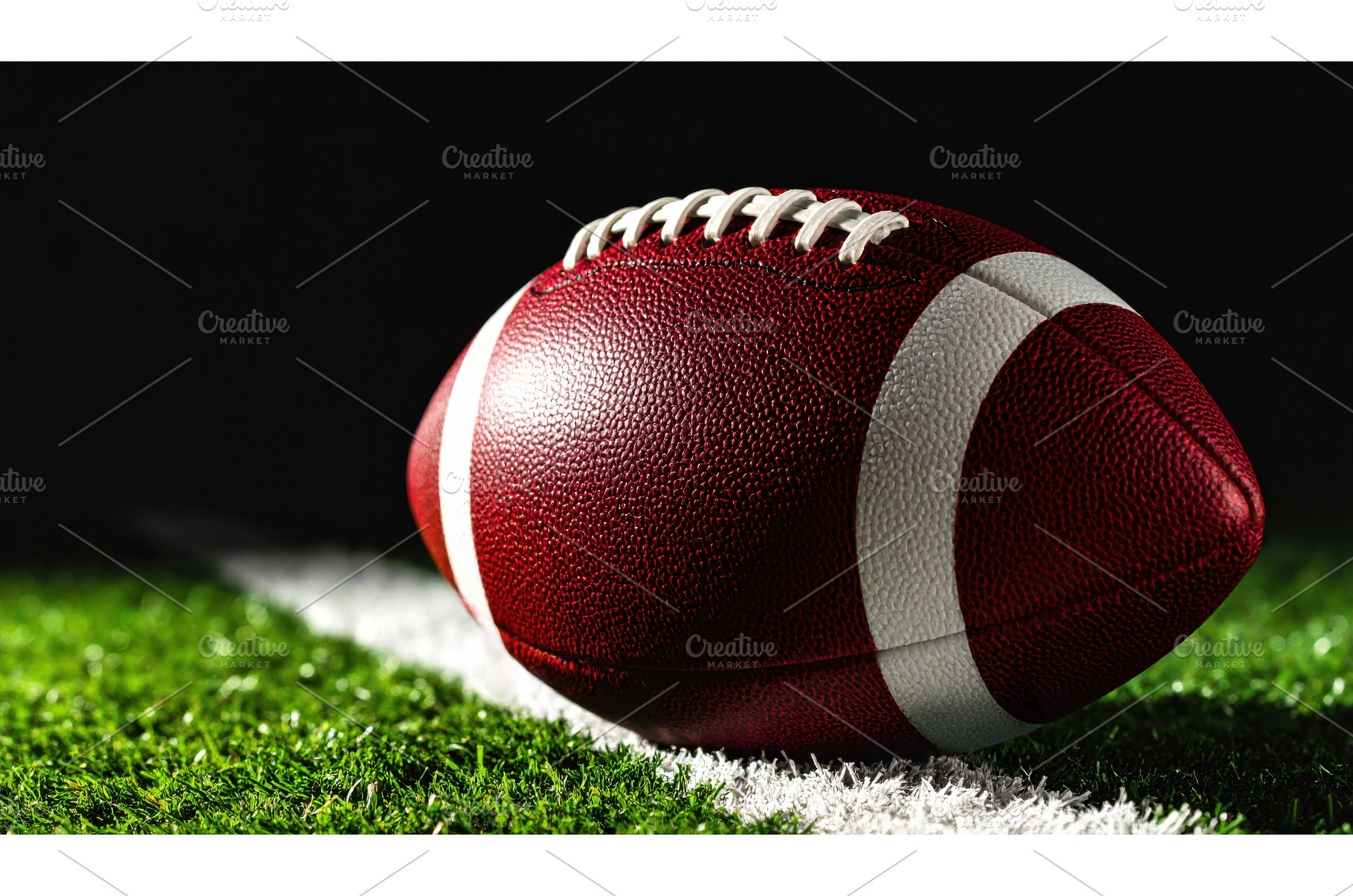 Close-up of American football on, a Sports & Recreation Photo by Igor Tichonow