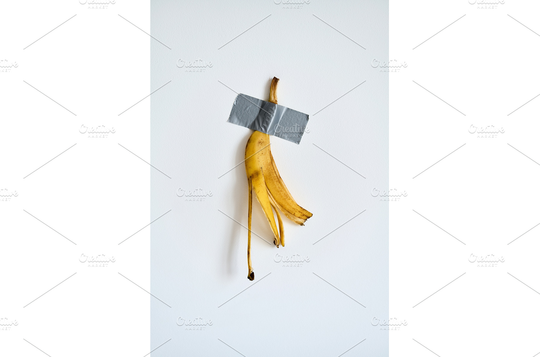 Banana peel taped to white wall, an Arts & Entertainment Photo by Gladkov photography