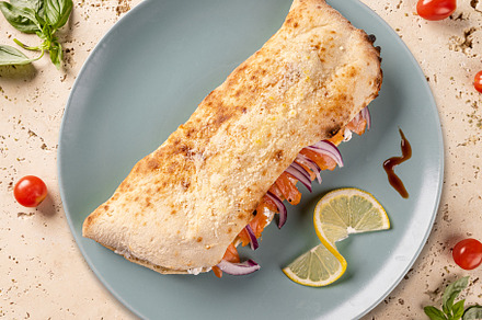 Delicious closed calzone pizza, a Photo by Grafvision photography