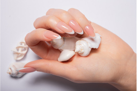 Hands with long nails with french, a Beauty & Fashion Photo by korabkova
