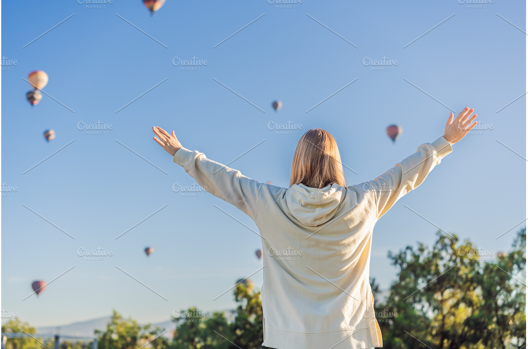 Female tourist standing with, a Holiday Photo by Elizaveta Galitskaya
