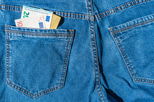 Pisa card with euro cash in jeans pocket, a Business Photo by Vapi