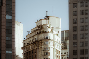 Art deco building between towers, an Architecture Photo by SkyNext