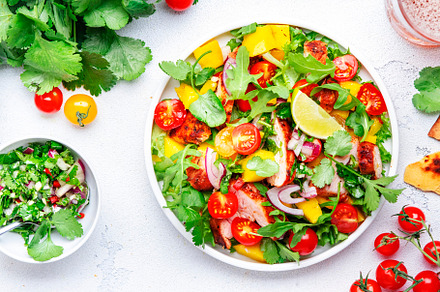 Gourmet salad with grilled chicken and mango salsa, tomato, cila, a Food & Drink Photo by 5PH