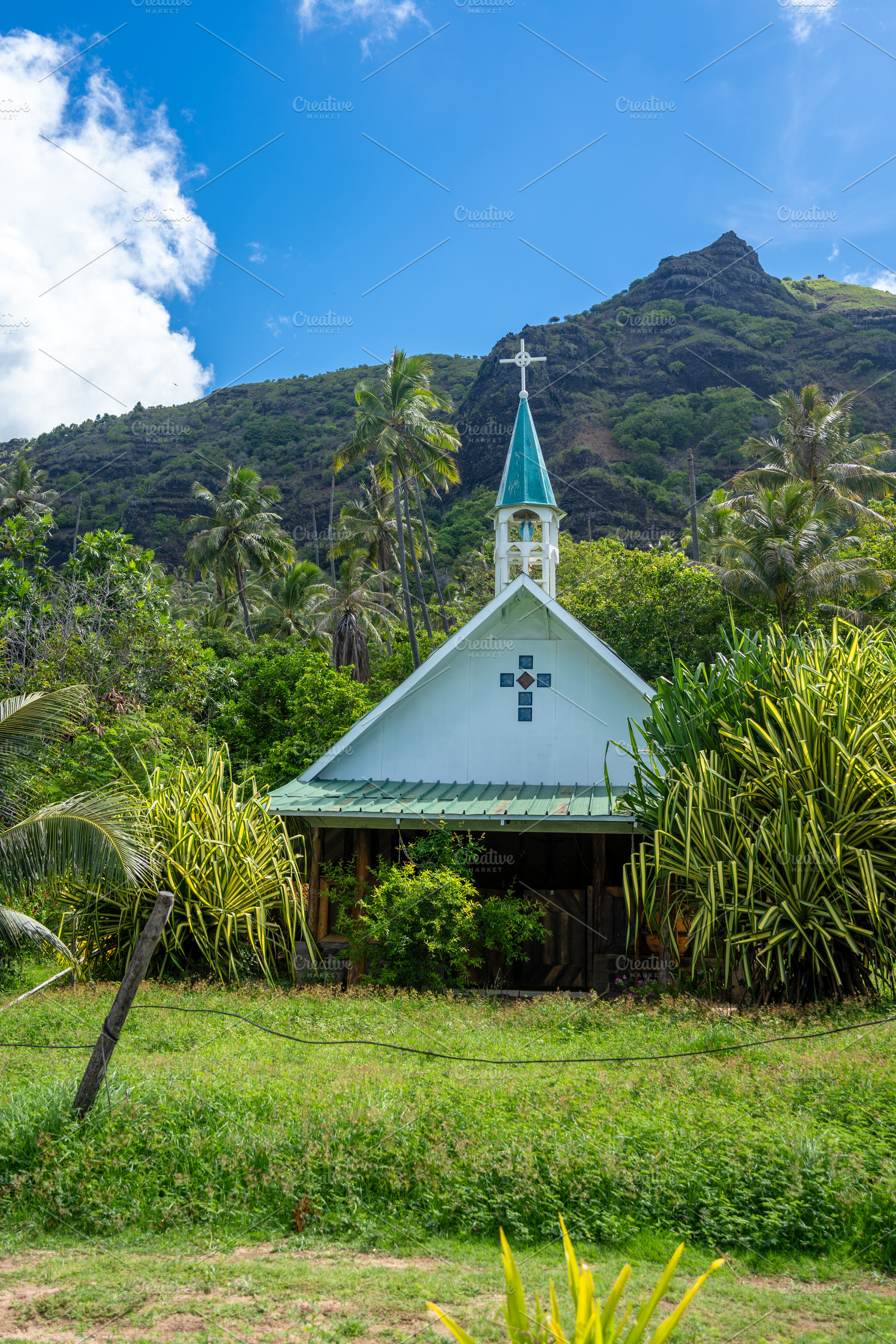 Small church in Anaho Bay, Nuku Hiva, French Polynesia, amid lus, an Architecture Photo by GoodGoods