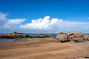 Rocky tidal island under bright skies in Tregastel, Brittany, Fr, a Nature Photo by GoodGoods