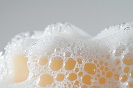 Soap with foam on white background, a Beauty & Fashion Photo by AlyaAnd