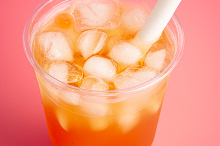Passion Fruit Boba Tea on a Pink Background