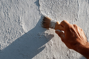 Painting a wall in sunlight, a Photo by Beautiful things