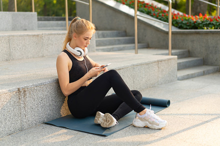 Sport and Fitness Young Adult Caucasian Woman Sitting Exercise Mat Concrete Flo, a Person Photo by andreonegin market