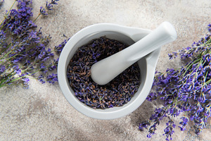Lavender flowers and mortar with pestle for aromatherapy, a Health & Medical Photo by Olena Rudo