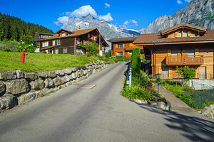 Charming wooden homes in Switzerland, an Architecture Photo by Alpine Dreams
