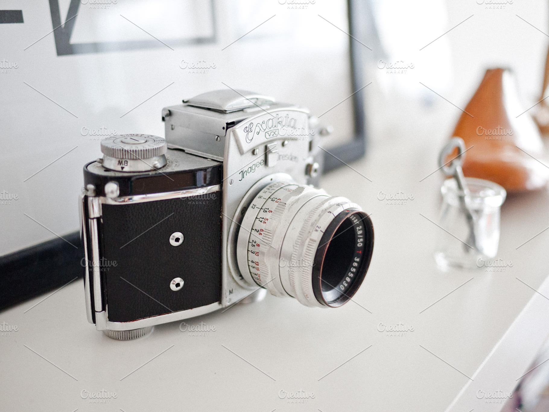 Vintage camera featuring office, minimal, and design, a Business Photo by ugmonk
