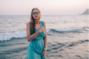 Woman in Flowing Dress on Seaside, a Person Photo by Jan Jack Russo Media