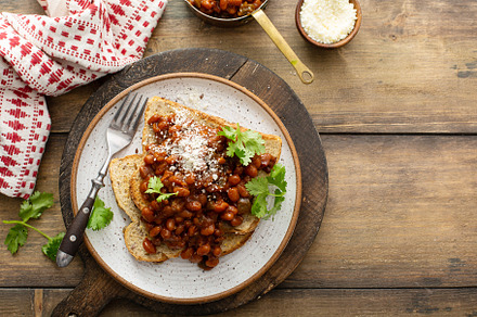 Baked beans with bacon on a toast