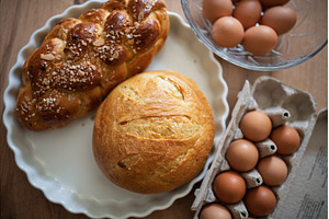 Homemade bread and eggs on rustic, a Food & Drink Photo by HalfPoint